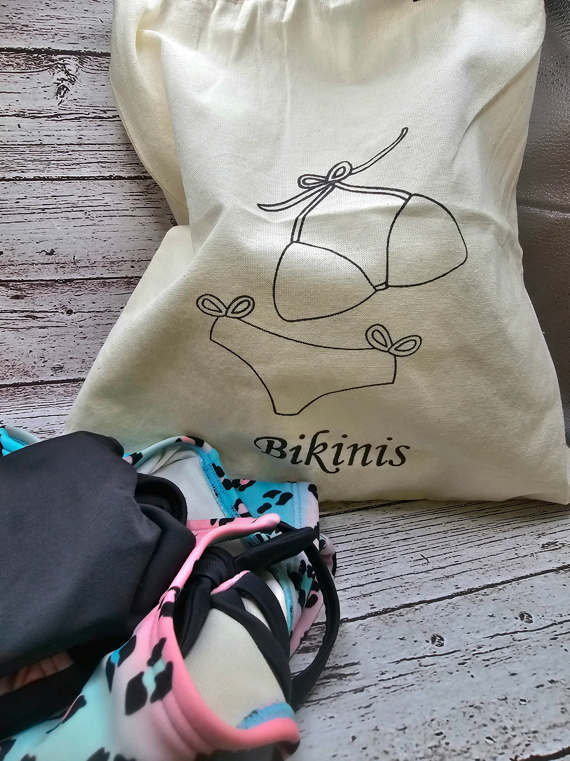 Reusable cotton beach wet bag for storing wet swimwear after swimming