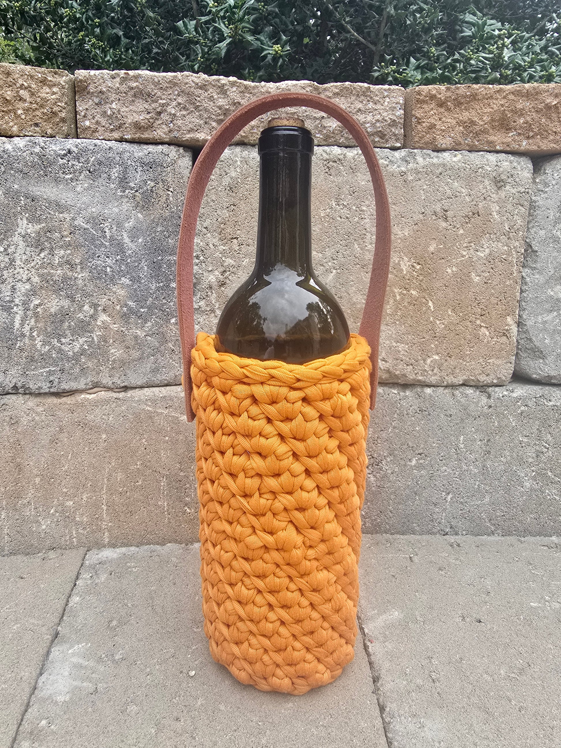 Handmade crochet wine bag carrier with leather handle – eco-friendly gift for wine lovers.