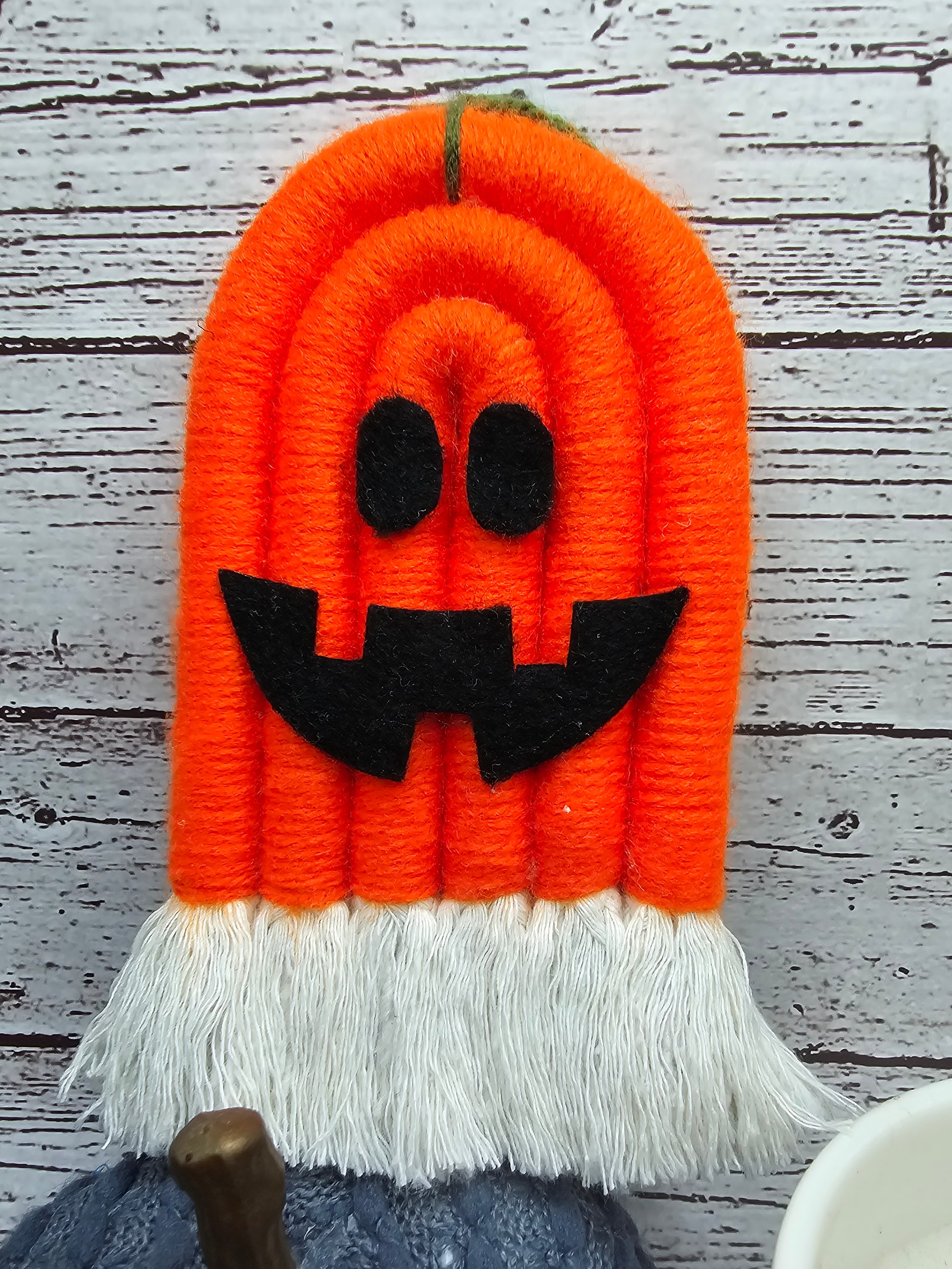 A tiny pumpking to bring a little spooky charm to your home