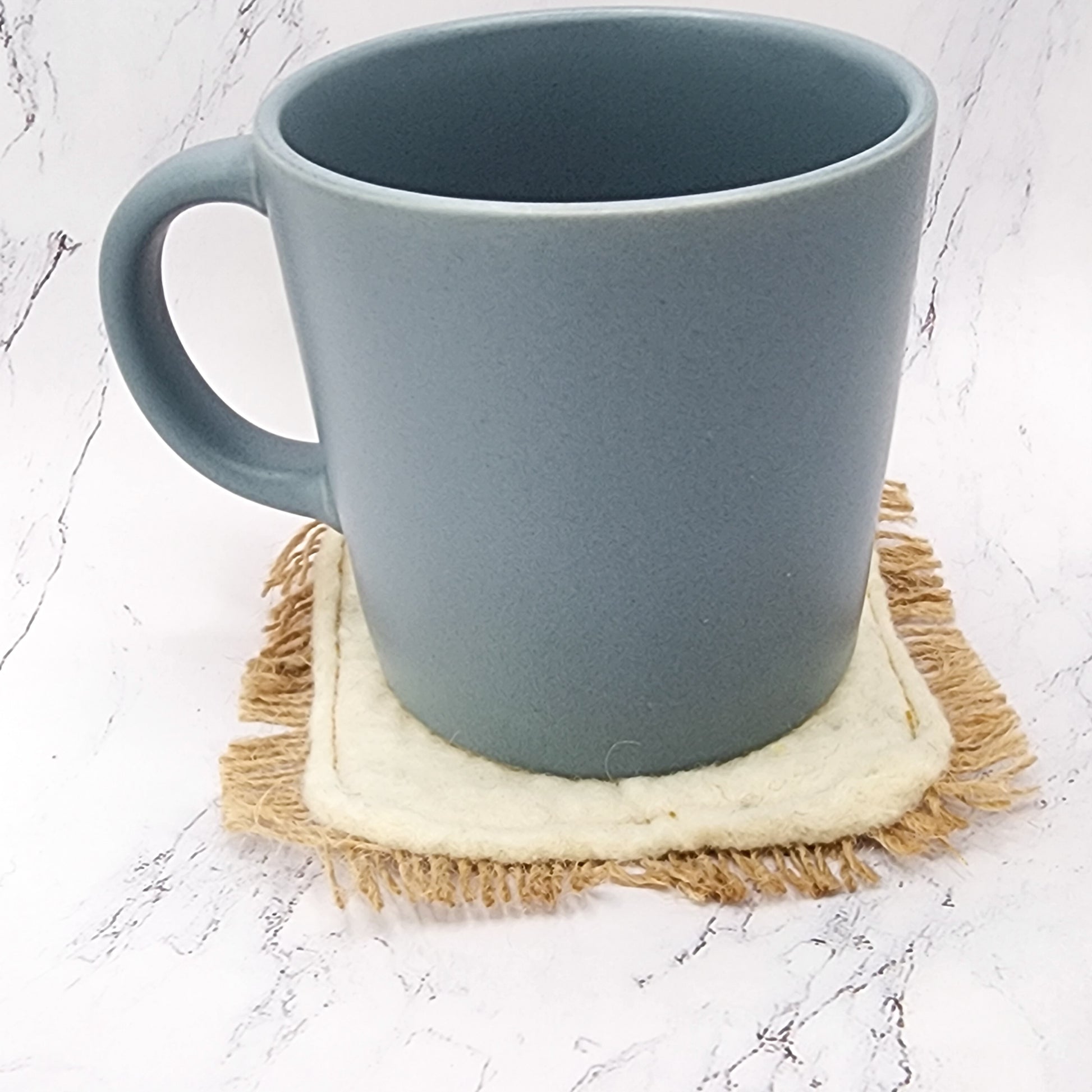 Natural felt coaster for coffee table