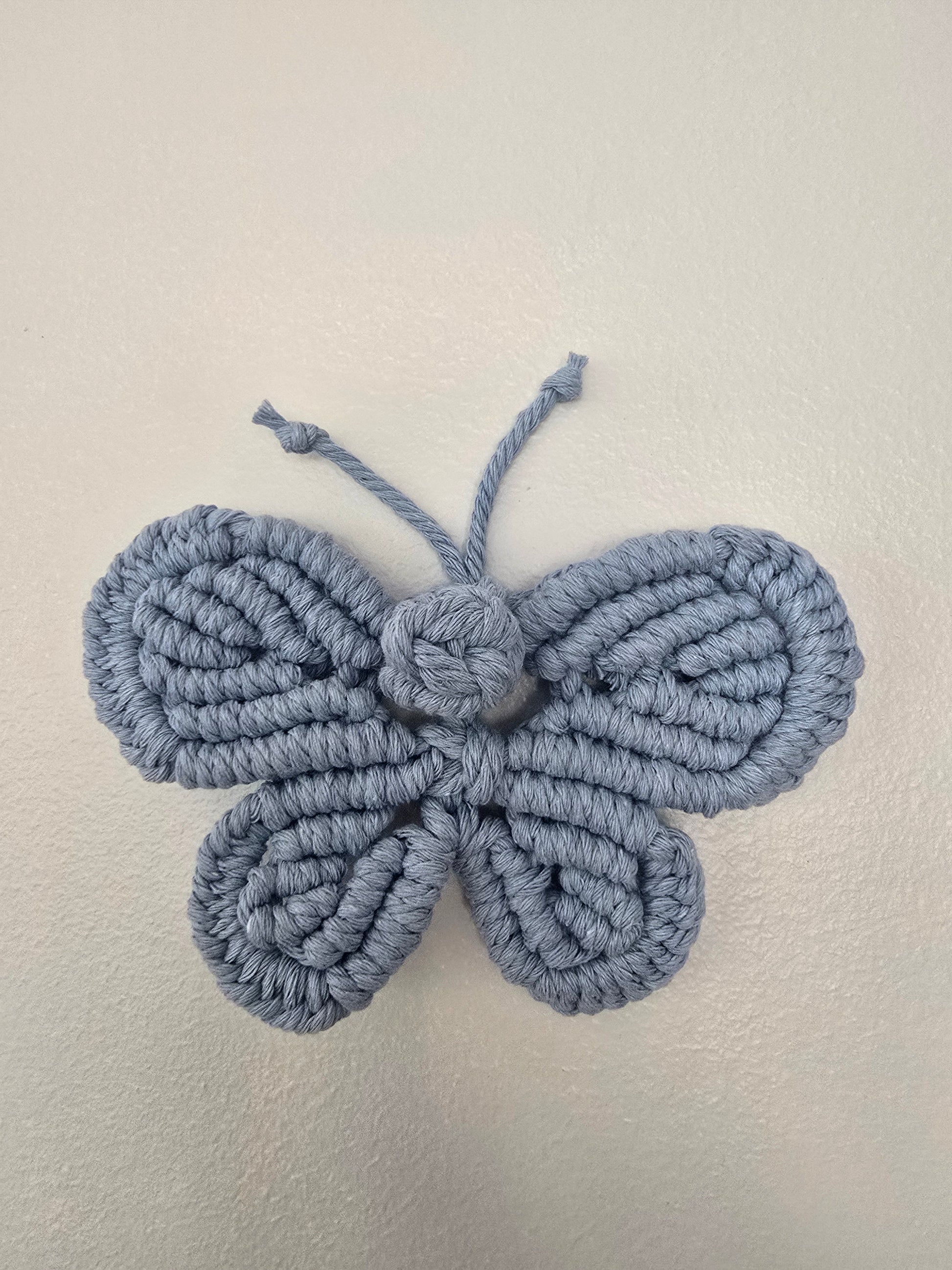 Cotton sun wall hanging with butterfly decor for kids room
