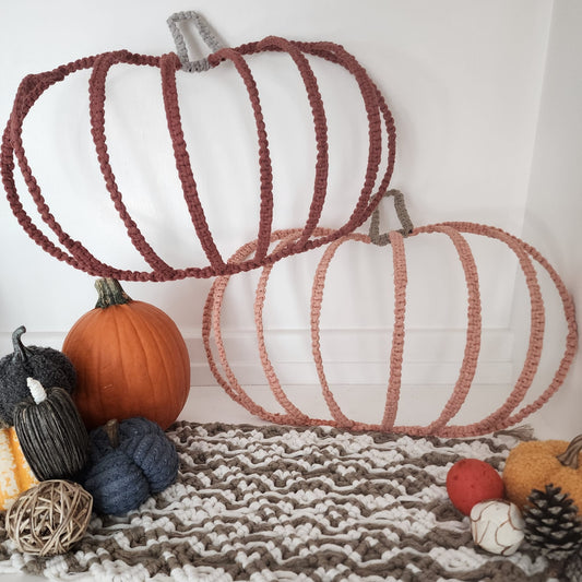 Handmade macrame pumpkin wall decor, autumn colors.

