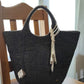 Handcrafted felt handbag made from Merino wool in Patagonia – sustainable and elegant handmade bag.