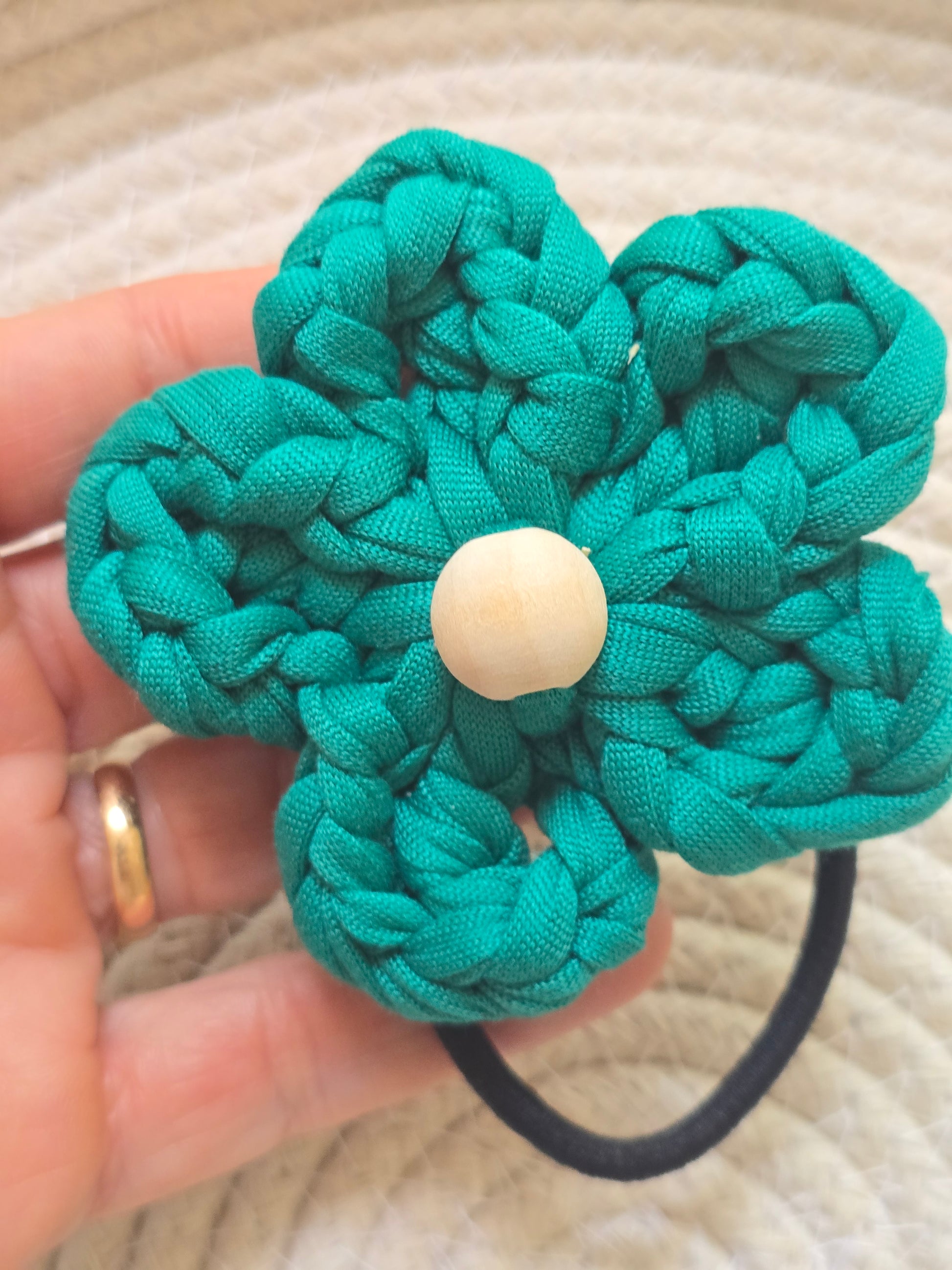 Close-up of handmade cotton floral hair accessory