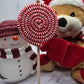 Handmade macramé candy cane ornament with red and white cotton cord – sustainable Christmas décor piece.