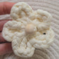 Close-up of handmade cotton floral hair accessory