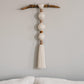 Minimal recycled cotton wall hanging with natural wood branch, handmade neutral boho wall decor