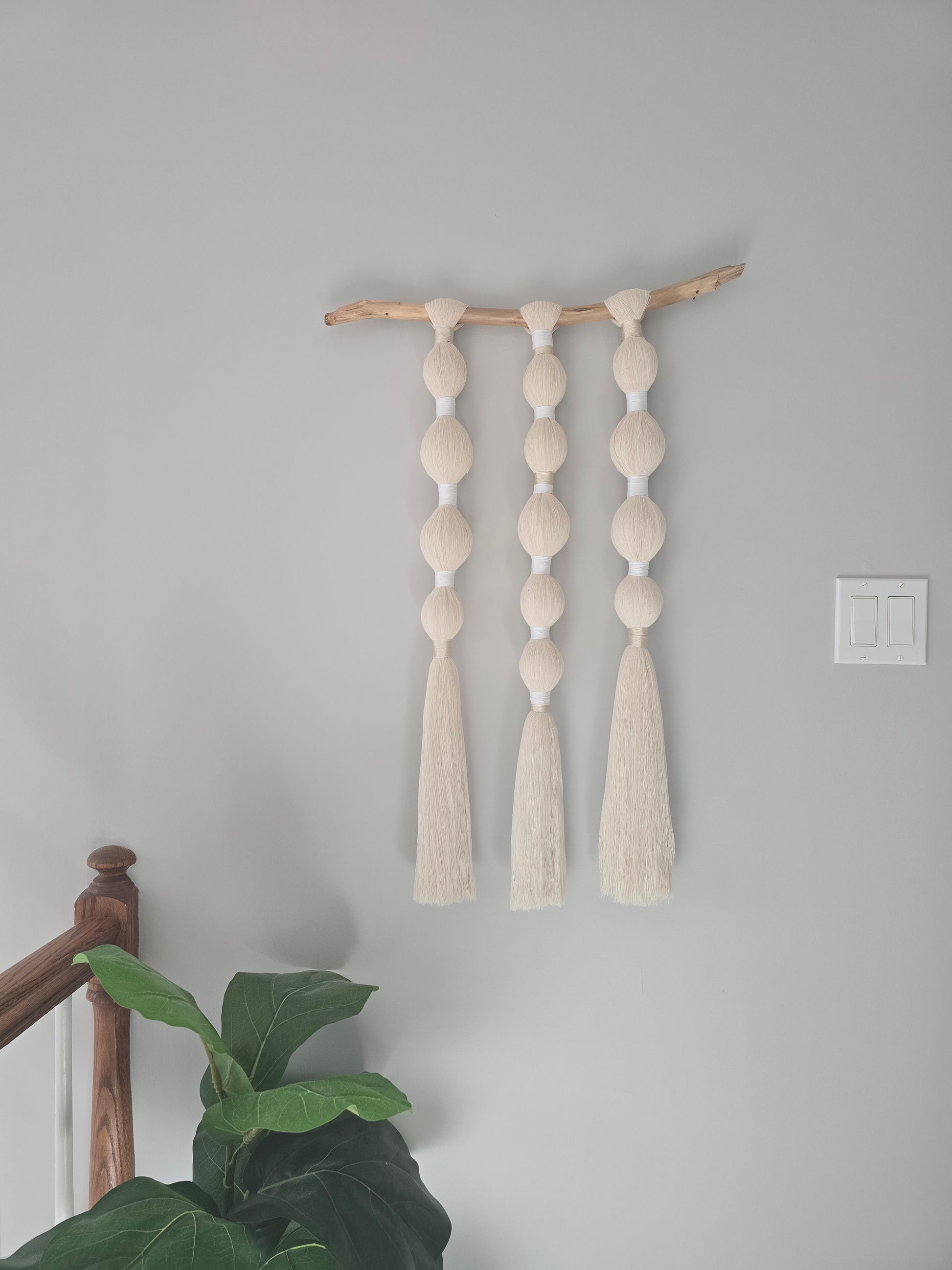 Handmade wall hanging woven with recycled cotton yarn, neutral boho decor by Ona Homestyle.