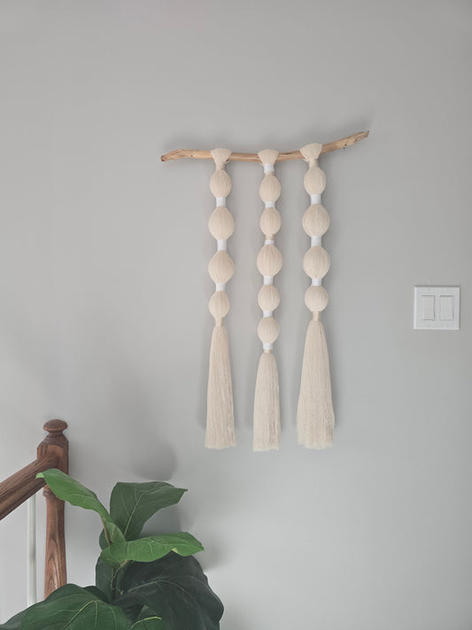 Handmade wall hanging woven with recycled cotton yarn, neutral boho decor by Ona Homestyle.