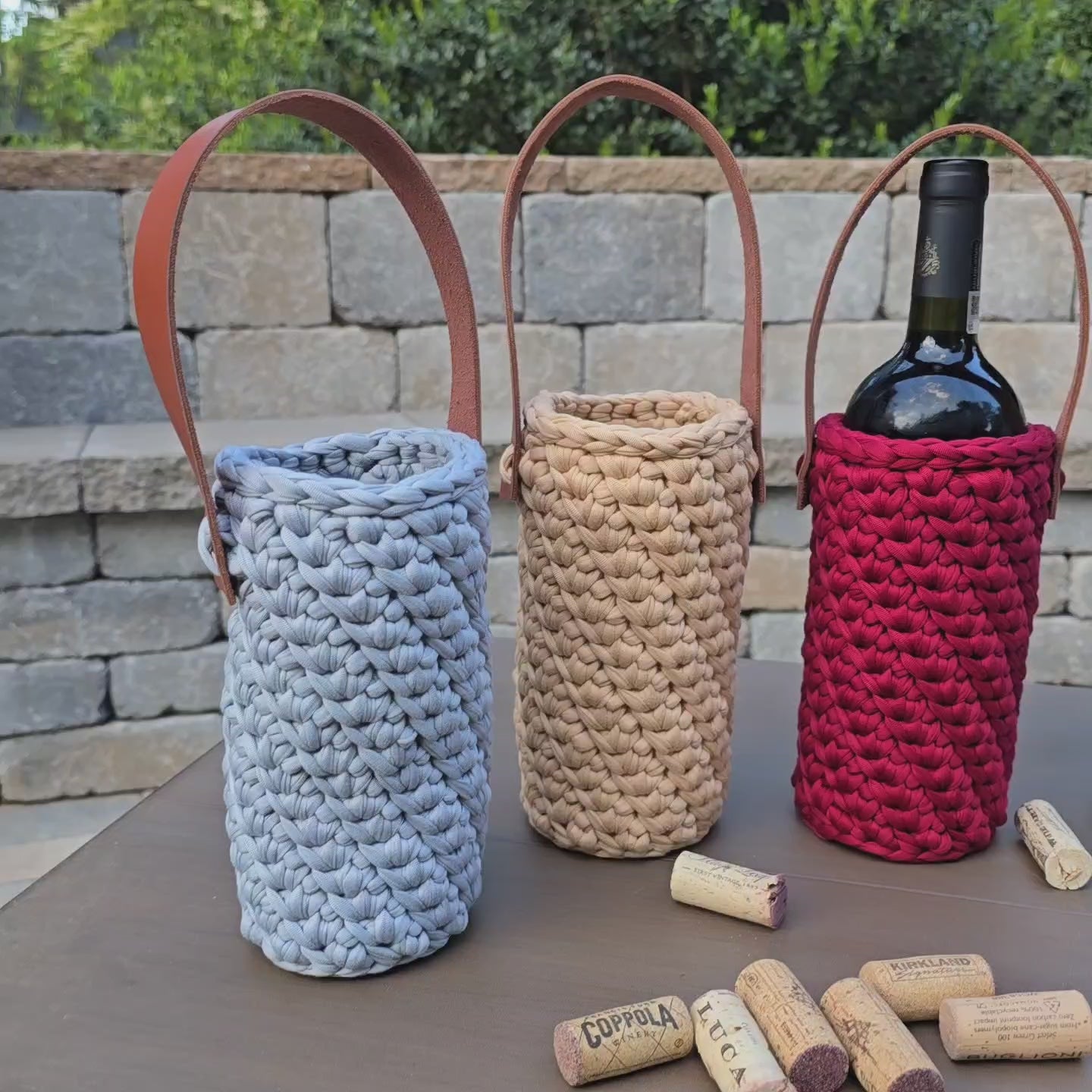 Handmade crochet wine holder with leather handle – eco-friendly and sustainable gift for wine lovers.