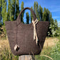 Handcrafted felt handbag styled as a sustainable fashion accessory – natural and timeless look.